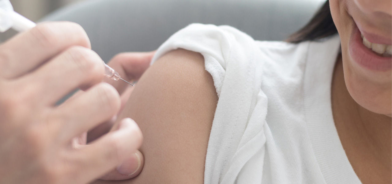person receiving immunization shot
